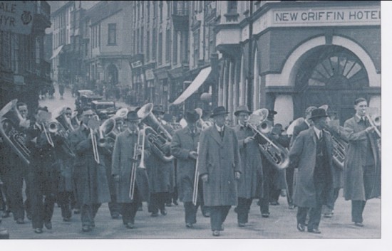 Brynmawr Silver Band playing at the funeral  of the late Mr William (Billy) Rogers marching down BeaufortStreet,Brynmawr