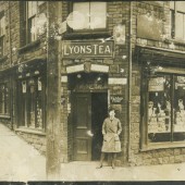 Miss Rose outside her fathers shop at School Terrace 