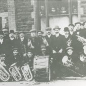 Cwm Town Band outside The Workingmen's Club in Crosscombe Terrace
